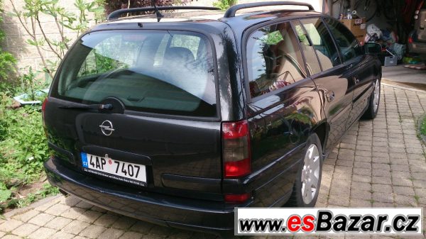 Opel Omega 2.6 V6 combi, spěchá! – fotografie 6