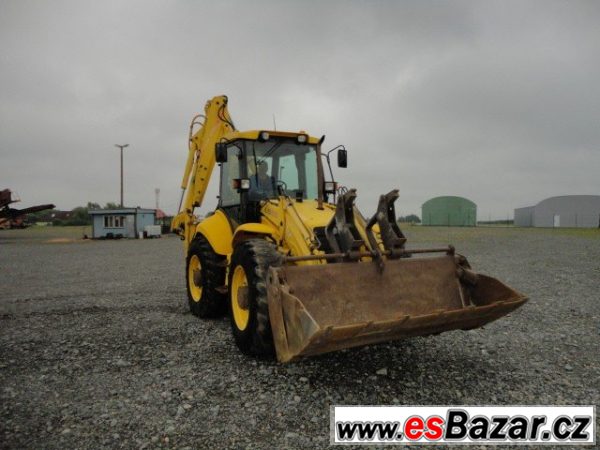 New Holland LB 115 B 4x4x4, r.v. 2004, barva žlutá – fotografie 3