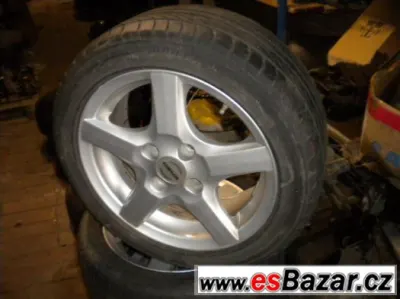 alu 4x100 15"  pneu 195/50/15,golf,felicia,astra,vento..