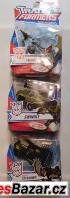 Sada tří Transformers Deluxe od Hasbro.