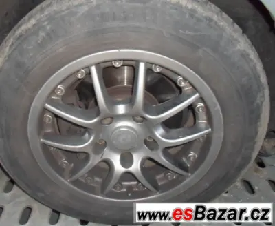BMW - hliníková zimní kola 15"- pneu 60%
