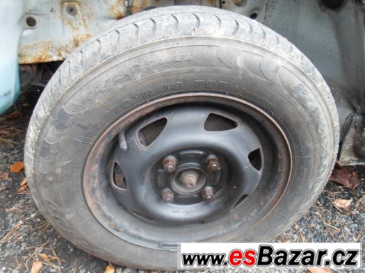 Ford - plechová kola 13" - pneu Firestone – fotografie 1