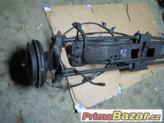 Mazda 323 BJ, r.v. 98 - 03 - zadní náprava – fotografie 3