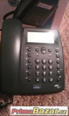 AEG pevný telefon se záznamníkem. 300 Kč.