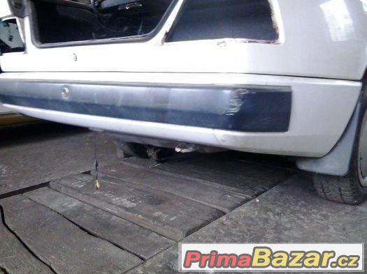 Mercedes W124 sedan - slusny zadni naraznik – fotografie 1