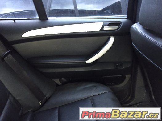 Černá stropnice, bílé lišty interieru BMW X5 E53 – fotografie 4