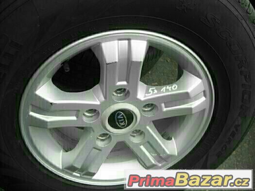 16" alu kola 5x139,7 KIA VČETNĚ PNEU 245/70/16 STAV 99% – fotografie 1