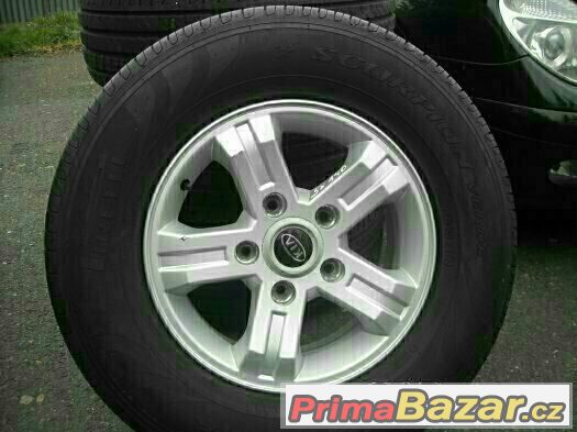16" alu kola 5x139,7 KIA VČETNĚ PNEU 245/70/16 STAV 99% – fotografie 2