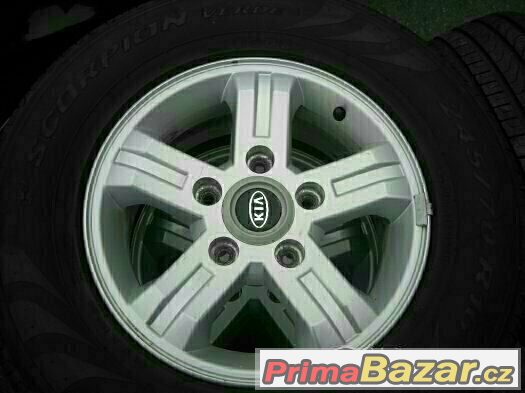 16" alu kola 5x139,7 KIA VČETNĚ PNEU 245/70/16 STAV 99% – fotografie 3