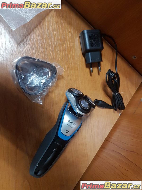 nový,nepoužitý holící strojek Philips