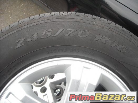 16" alu kola 5x139,7 KIA VČETNĚ PNEU 245/70/16 STAV 99% – fotografie 4