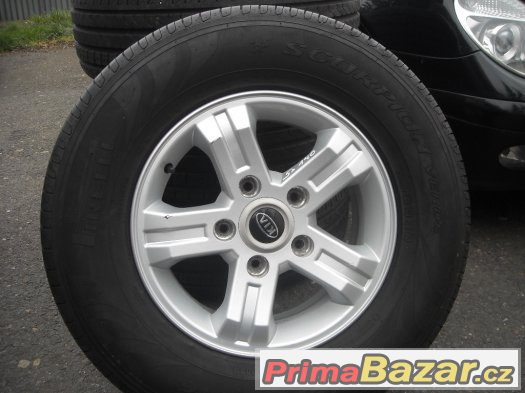 16" alu kola 5x139,7 KIA VČETNĚ PNEU 245/70/16 STAV 99% – fotografie 3