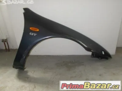 Mazda 323 F 94-97 pravý přední blatník