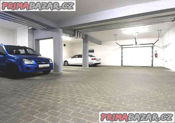 Prodám kryté garážové stání Brno, U Leskavy – fotografie 1